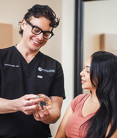 Surgeons performing a procedure in an operating room.