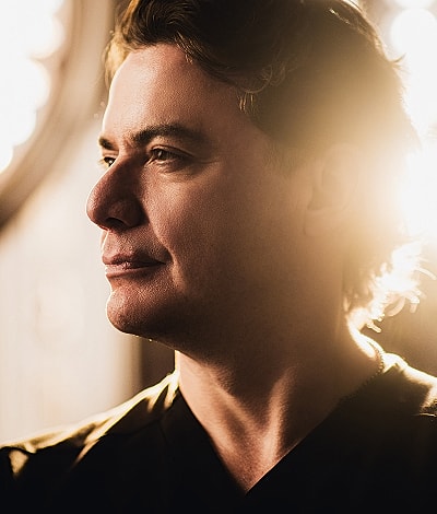 Person using tablet with stylus in clinic.