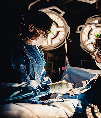 Surgical team performing an operation in hospital.