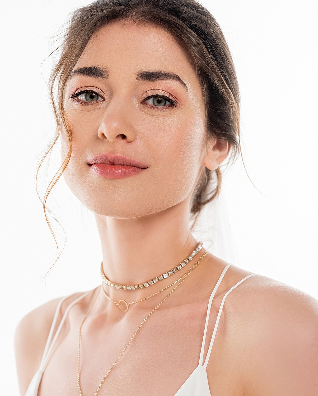 Model posing in stylish black asymmetrical outfit.