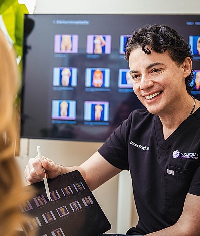 Person using tablet with stylus in clinic.