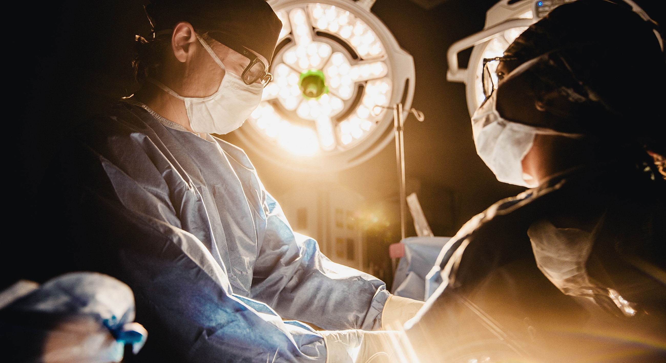 Cozy, modern treatment room with art and chairs.